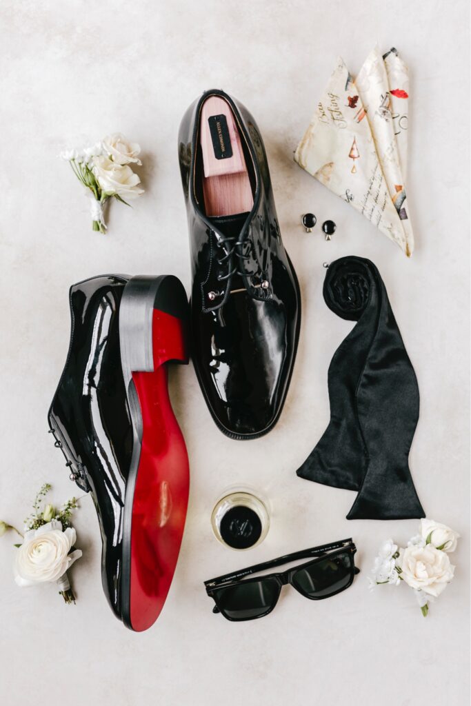 grooms wedding day details featuring Christian Louboutin's and a custom designed handkerchief