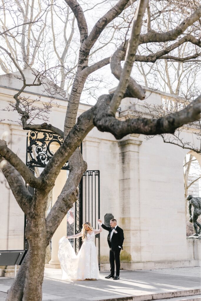 whimsical candid of bride and groom in the distance in Philadelphia