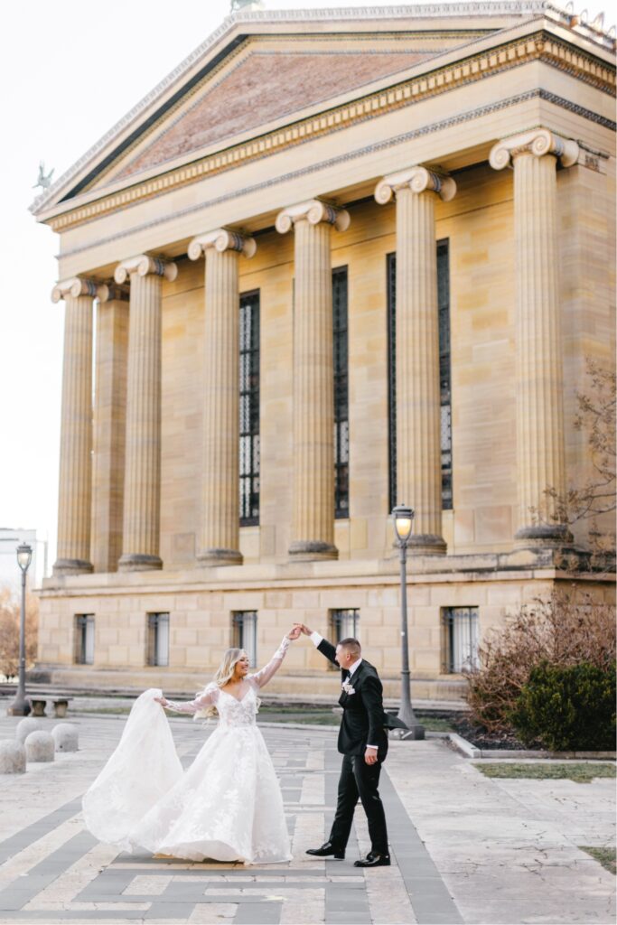bride and groom dancing before their wedding ceremony at the Art musuem in Philadelphia