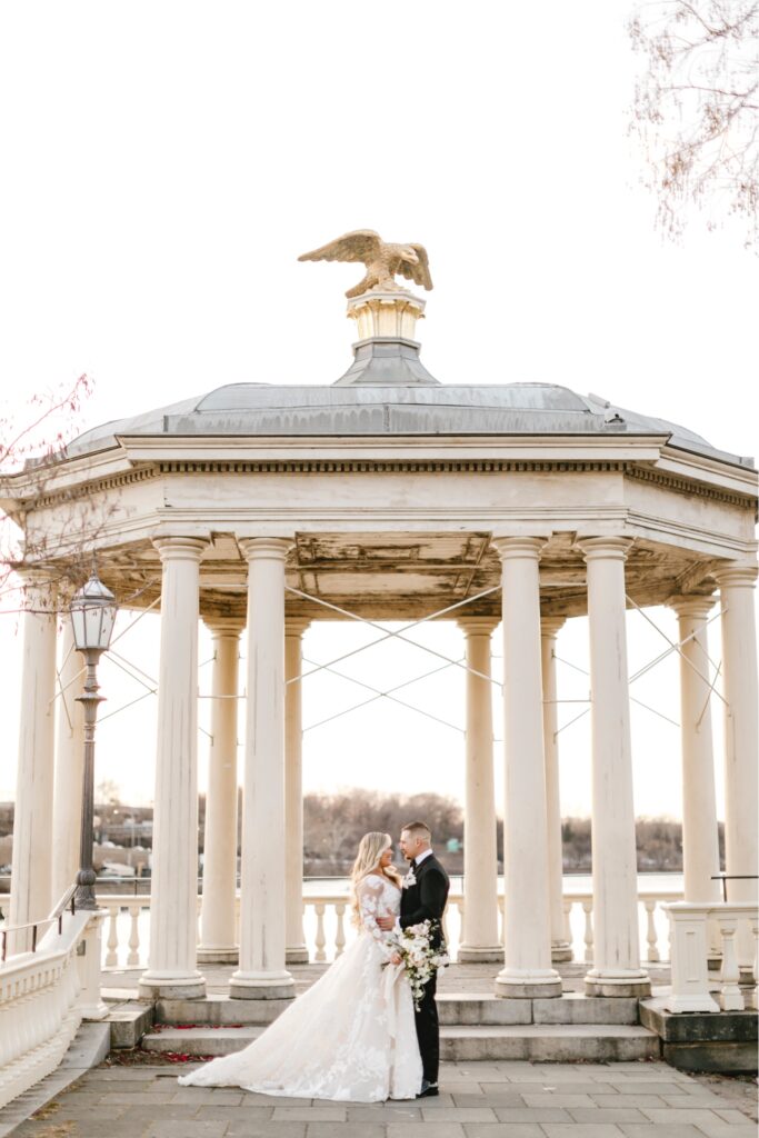 bride and groom under gazebo at Philadelphia's waterworks location
