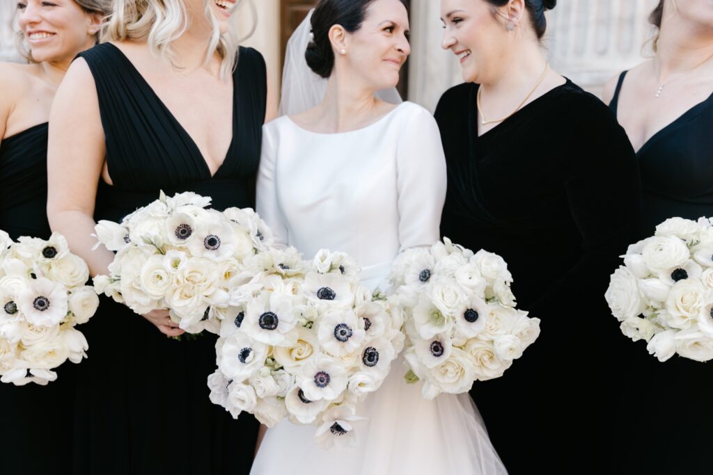 bridal party's floral bouquets of poppy anemone flowers