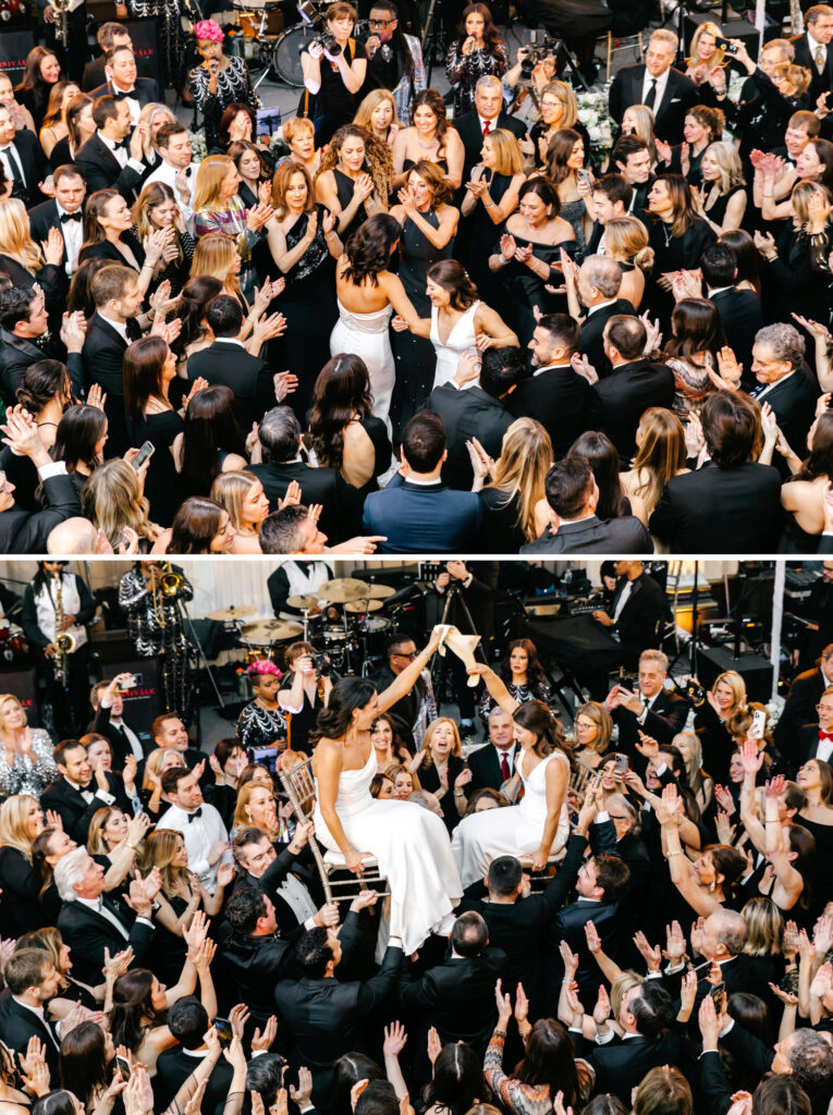 lesbian couple during the hora at their wedding reception in Center City Philadelphia