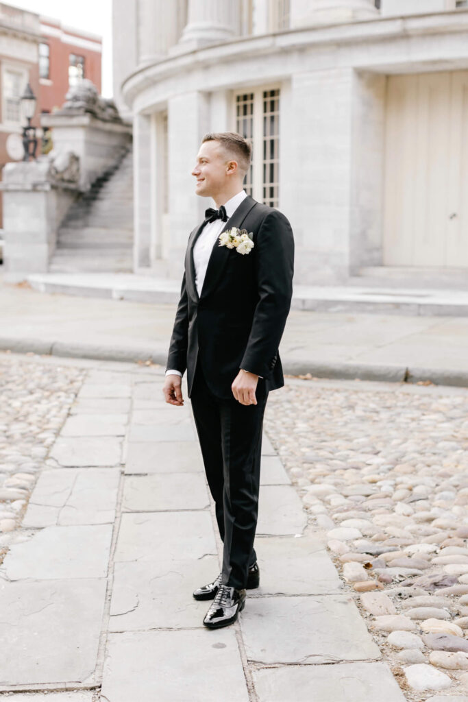 portrait of groom before his fall wedding in Philadelphia