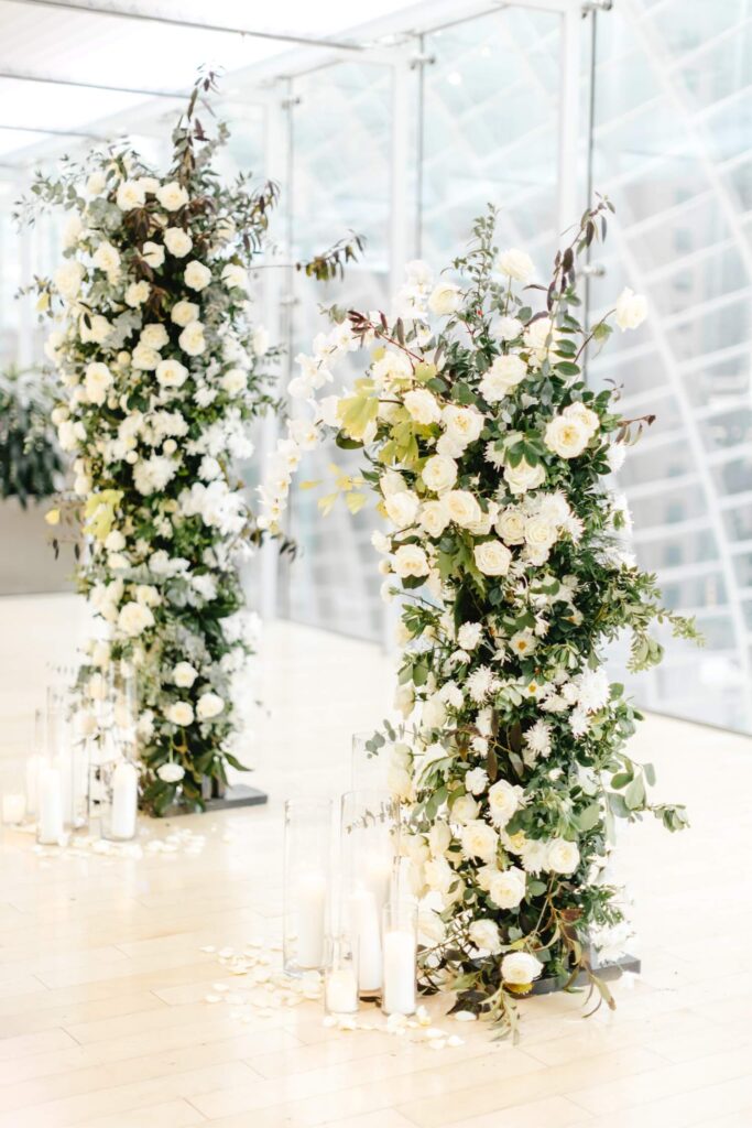 All white floral wedding ceremony arch