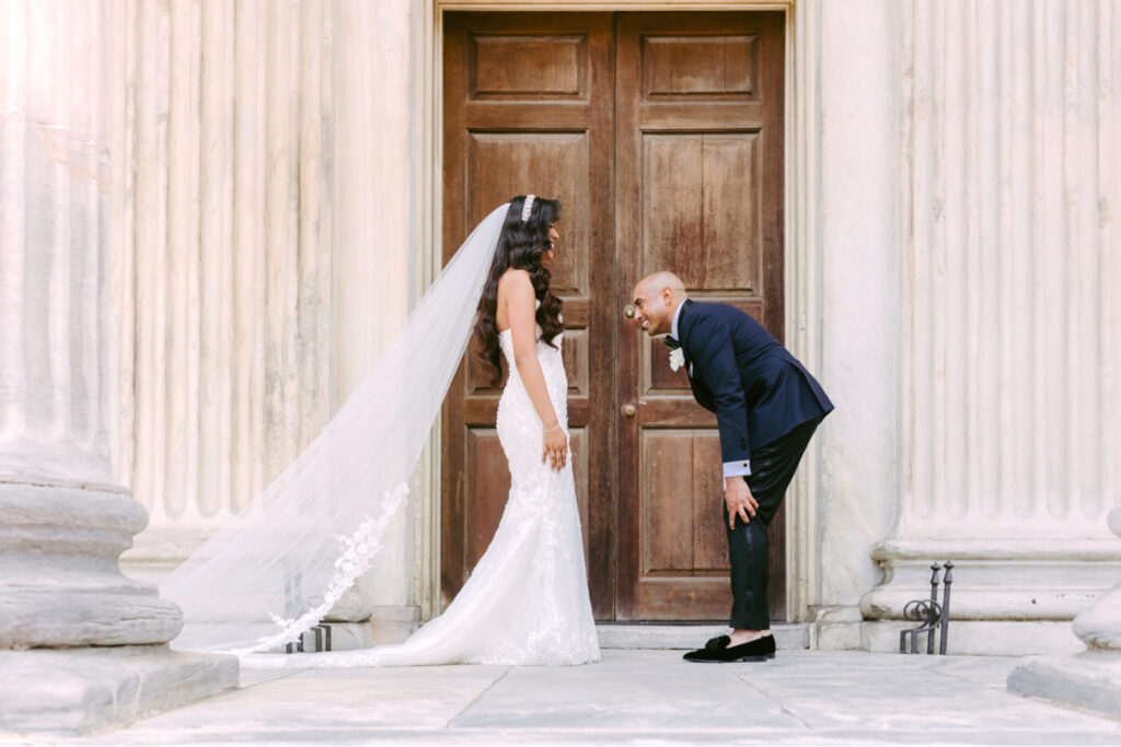 bride and grooms first look at first national Bank in Philadelphia by Emily Wren Photography