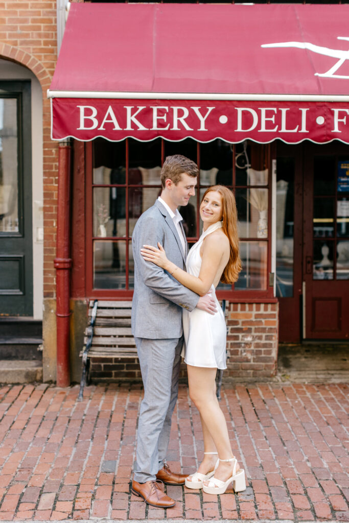 Engagement portraits at Wine & Cheese shop in Downtown Boston by Emily Wren Photography