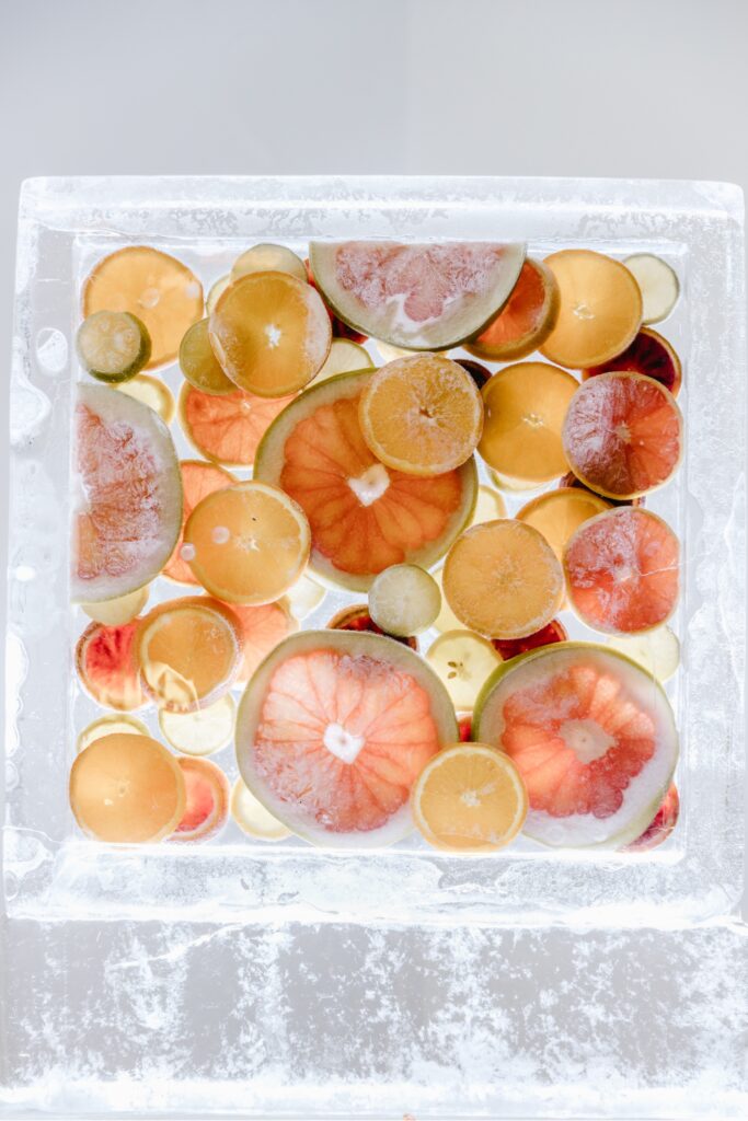 Citrus ice sculpture for a Spring Philadelphia wedding by Emily Wren Photography