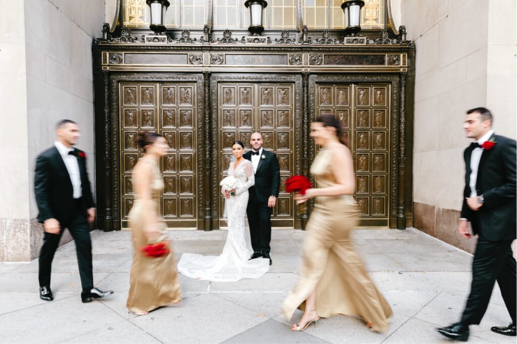 Bridal party portrait on Avenue of the Arts on Broad Street in Center City Philadelphia by Emily Wren Photography