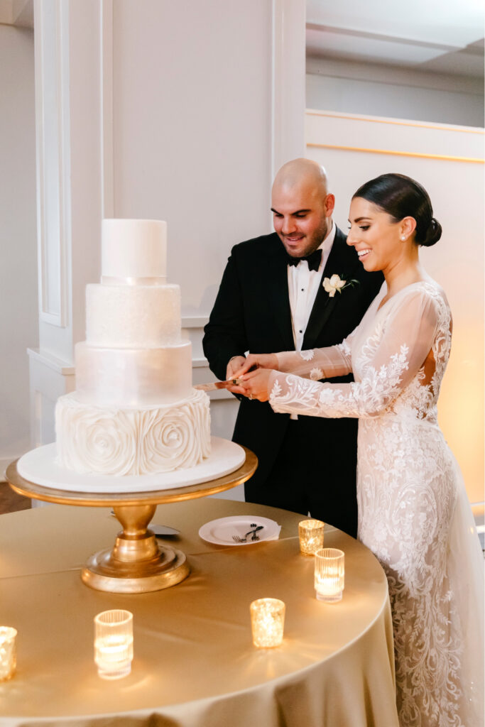 bride and groom cutting their 4 tier wedding cake at Cescaphe's The Lucy by Emily Wren Photography