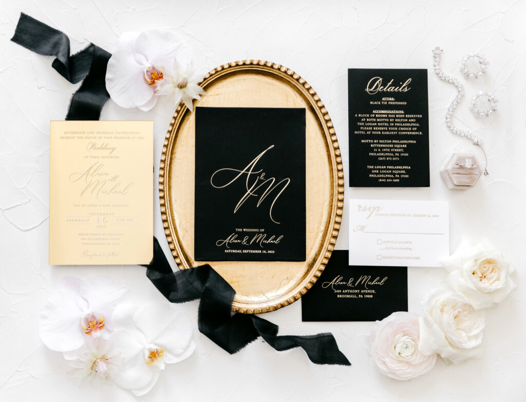 black & gold wedding invitation details