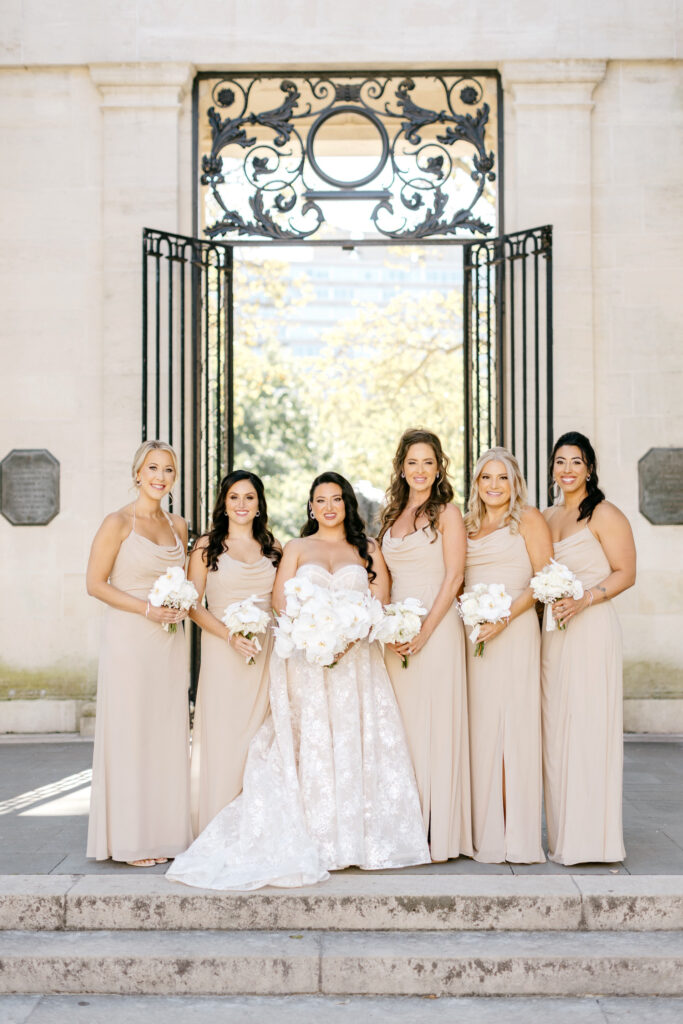 bride with her bridesmaids in beige bridesmaid dresses in Philadelphia, Pennsylvania