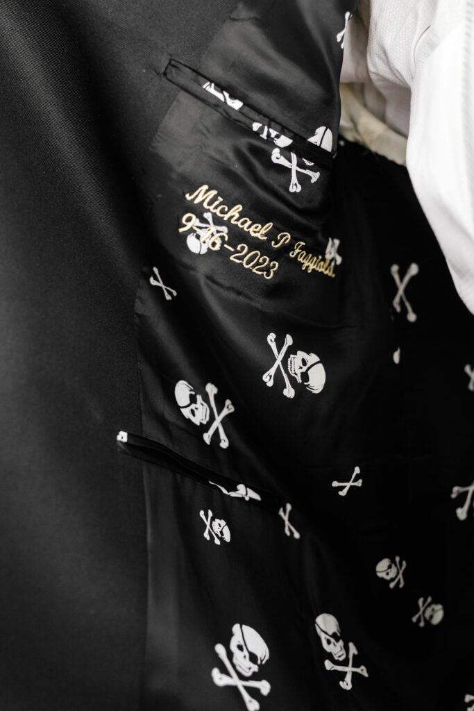 custom groom's tux interior with skull and bones