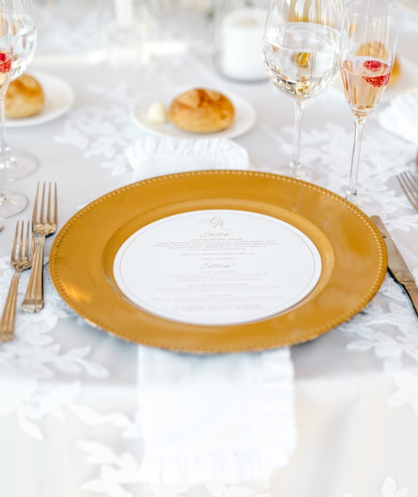 white & gold wedding reception plates