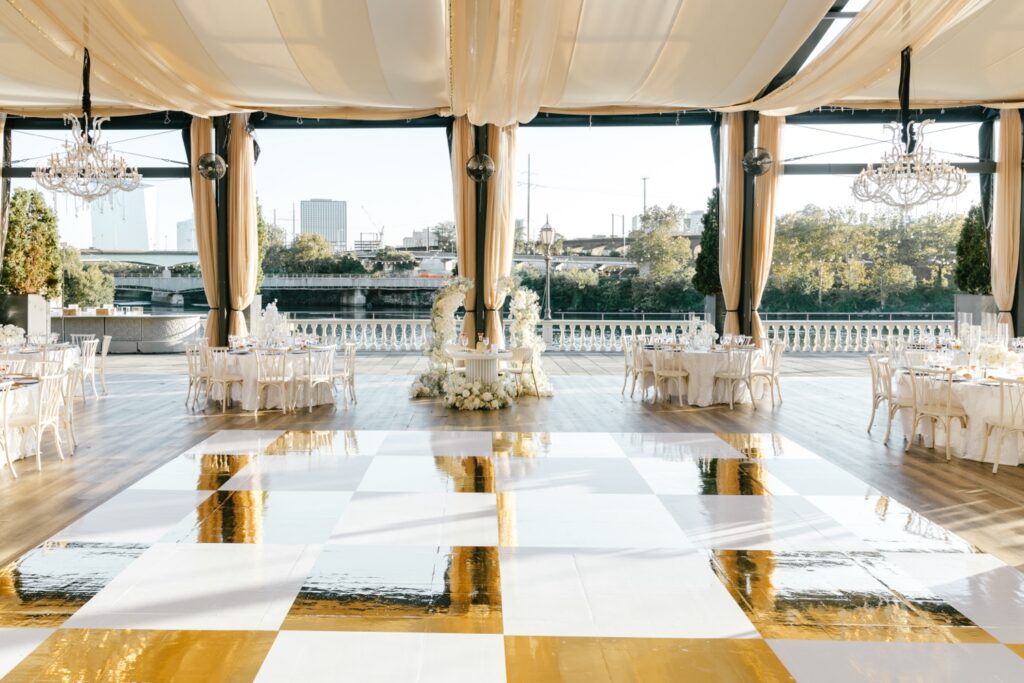 white & gold checkered dance floor at Cescaphe wedding reception