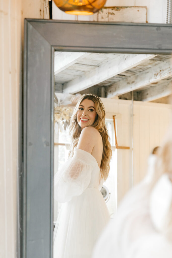 bride getting ready for her Summer Pennsylvania wedding by Emily Wren Photography