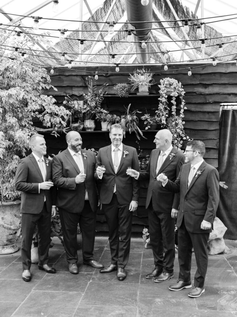 groom with groomsmen by Emily Wren Photography