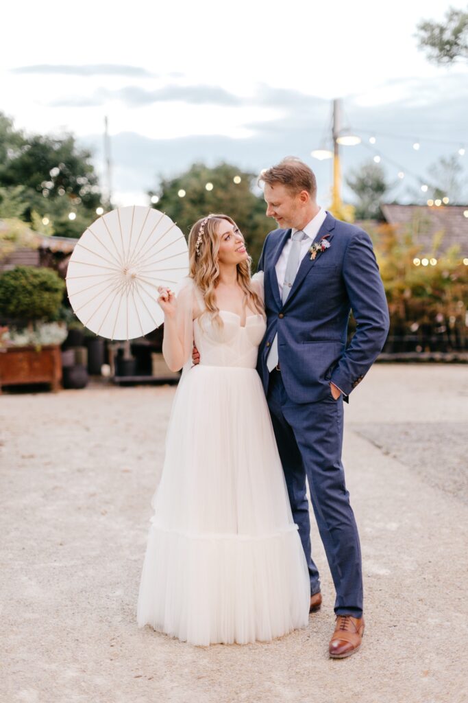 sunset portrait of bride & groom at Terrain at Styer's for summer wedding day by Emily Wren Photography