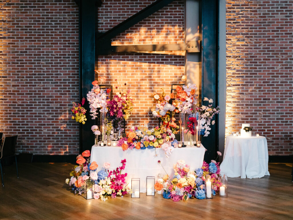 Vibrant colorful spring floral sweetheart table