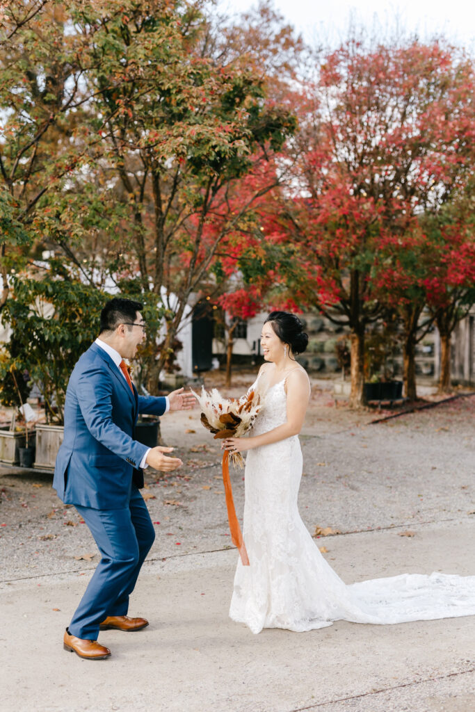 funny bride & groom first look during fall wedding day in Pennsylvania