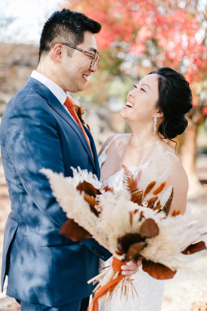 bride & groom on beautiful fall wedding day in Glen Mills, PA by Emily Wren Photography