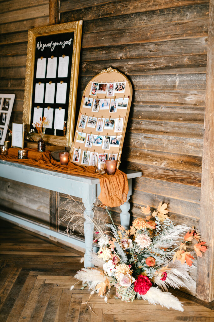 polaroid picture display at fall wedding reception