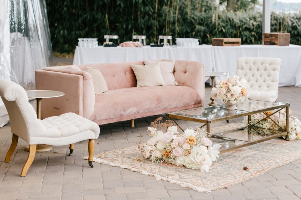 Blush pink & white wedding cocktail hour seating area at Glen Foerd Mansion