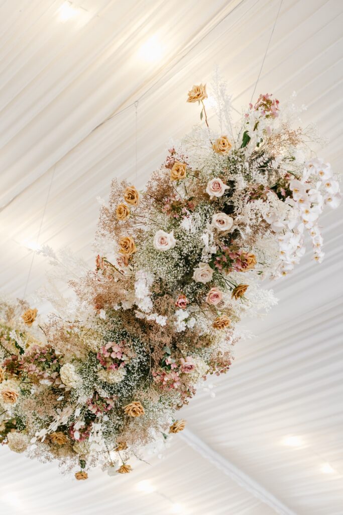 summer floral ceiling piece at Glen Foerd wedding reception