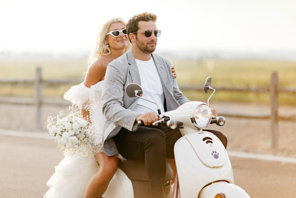 engaged couple riding motorcycle at New Jersey shore point by Emily Wren Photography