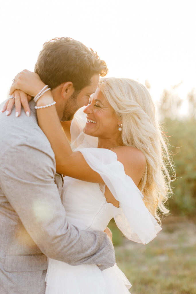engagement photos during golden hour in Ocean City NJ by Emily Wren Photography