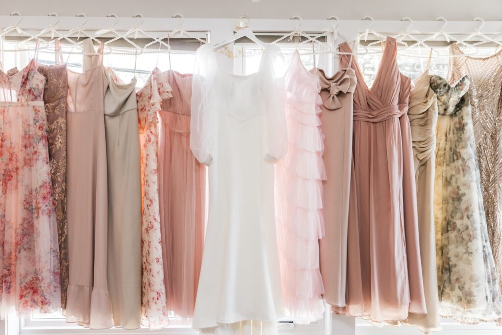 90's inspired wedding dress with mismatched blush pink bridesmaid dresses