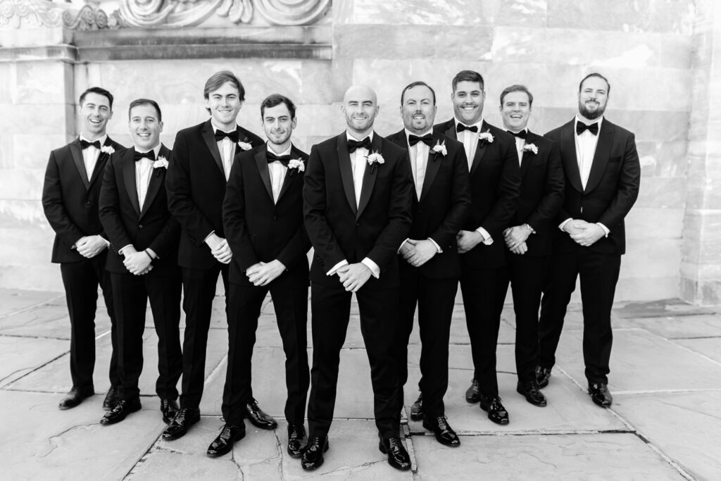 groom with groomsmen in Old City Philadelphia by wedding photographer Emily Wren Photography