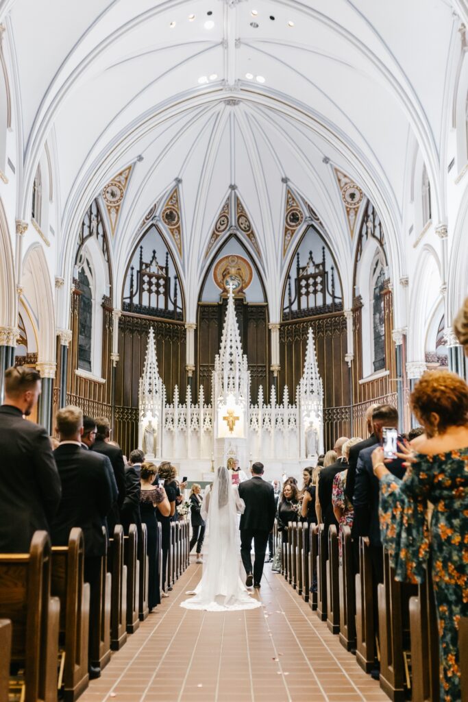 bride walking down the aisle in Philadelphia church