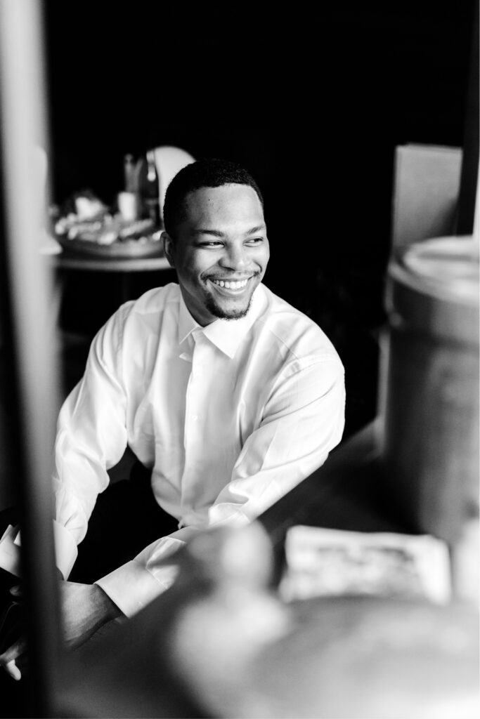 groom getting ready for his fall wedding in Washington DC by Emily Wren Photography