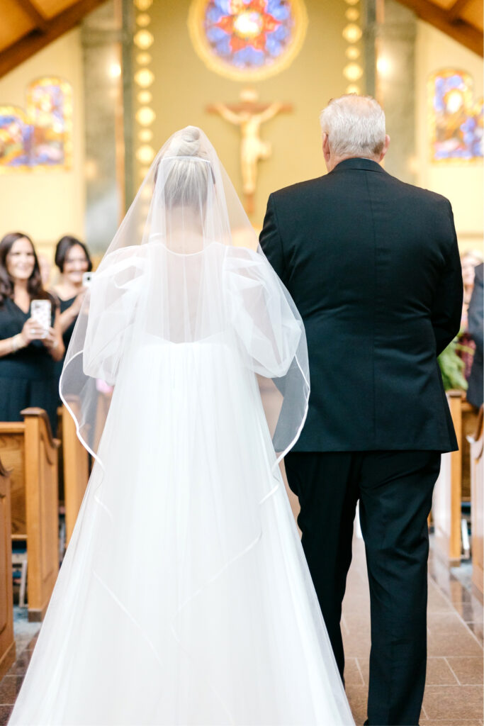 bride walking down the aisle in a New Hope PA church