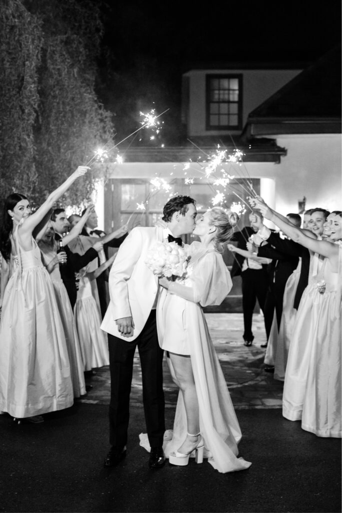 bride & groom during sparkler exit after their New Hope wedding reception by Emily Wren Photography