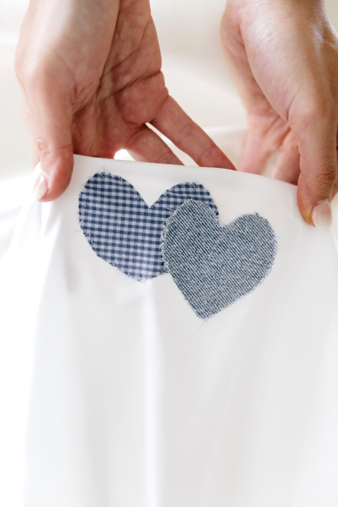 blue heart sewn into bridal gown