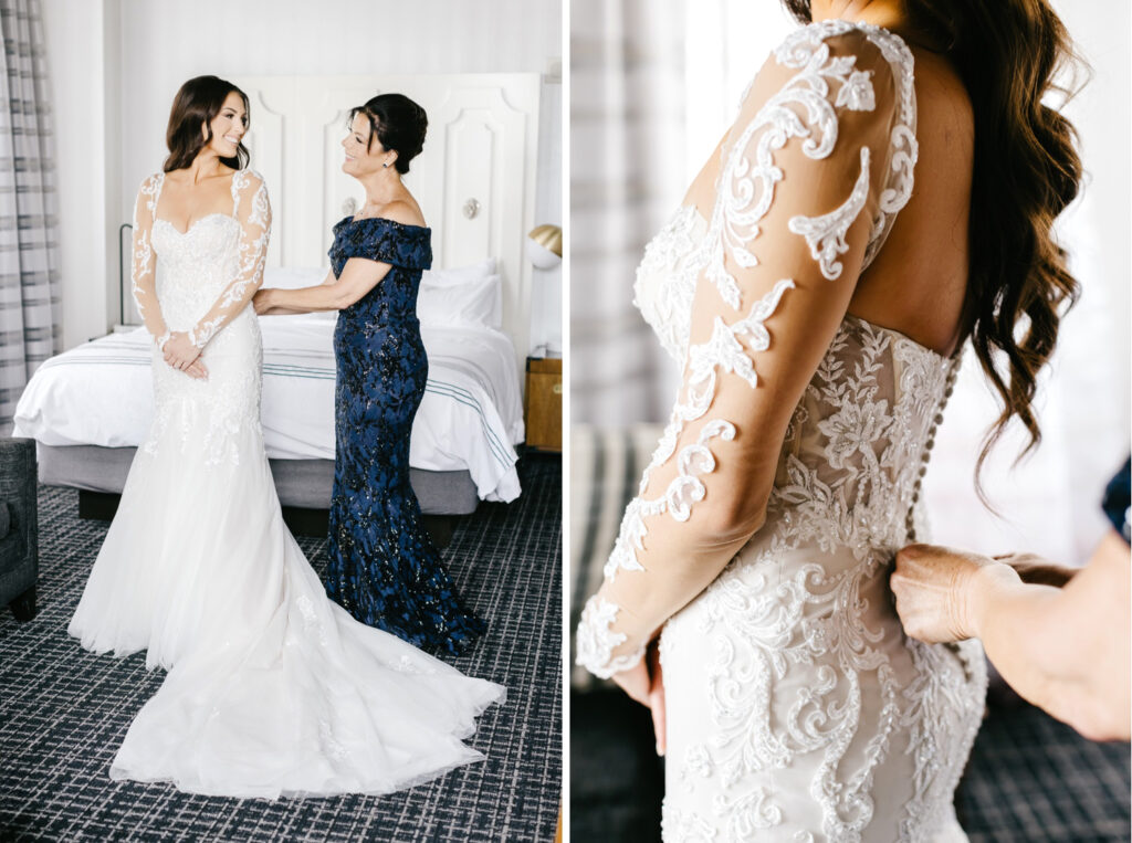 bride's mother helping her into her elegant lace sleeved wedding gown in Philadelphia, PA