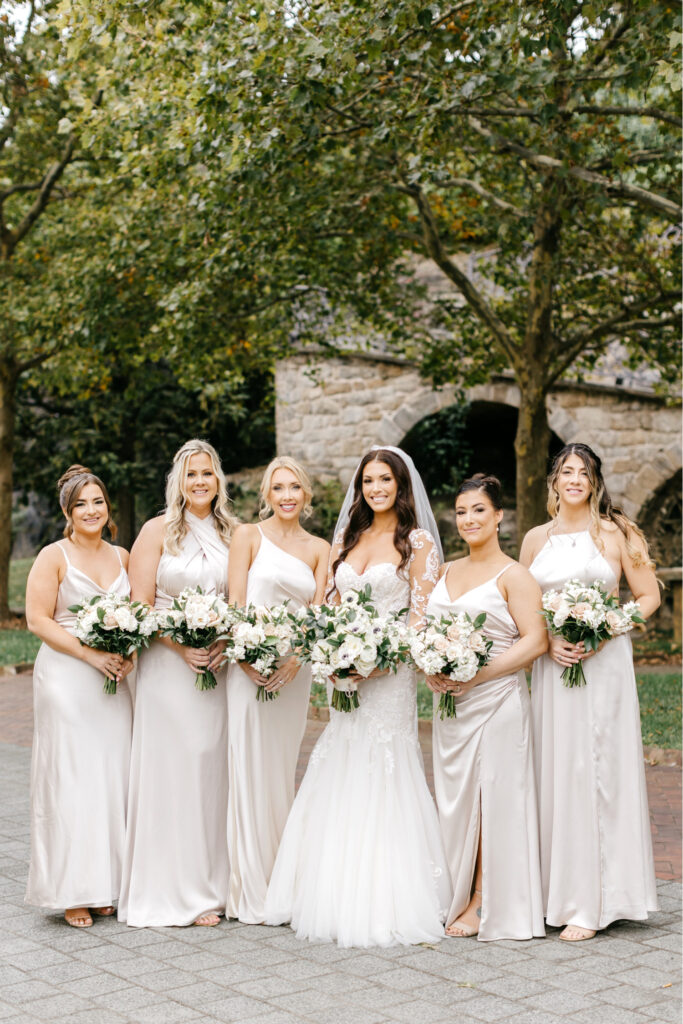 bride with her bridesmaids in Fairmount, Philadelphia by Emily Wren Photography