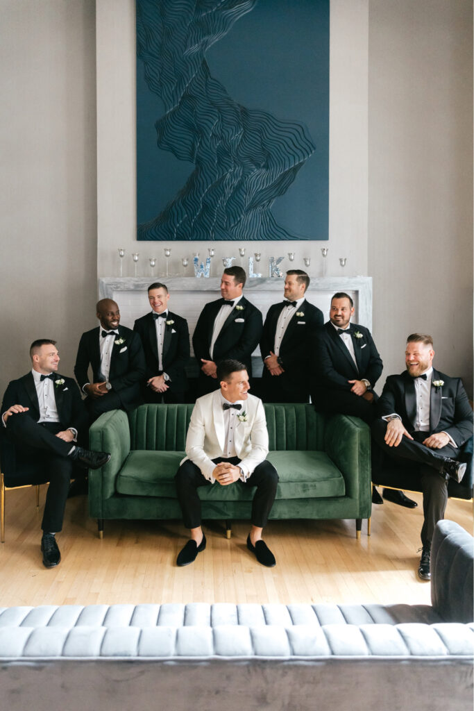 groom with his groomsmen before his fall wedding in Philadelphia