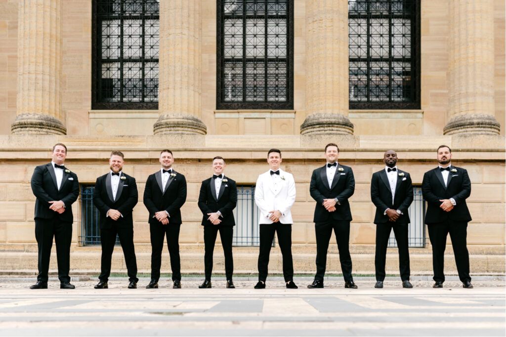 groom and groomsmen at Philadelphia Art Museum by Emily Wren Photography