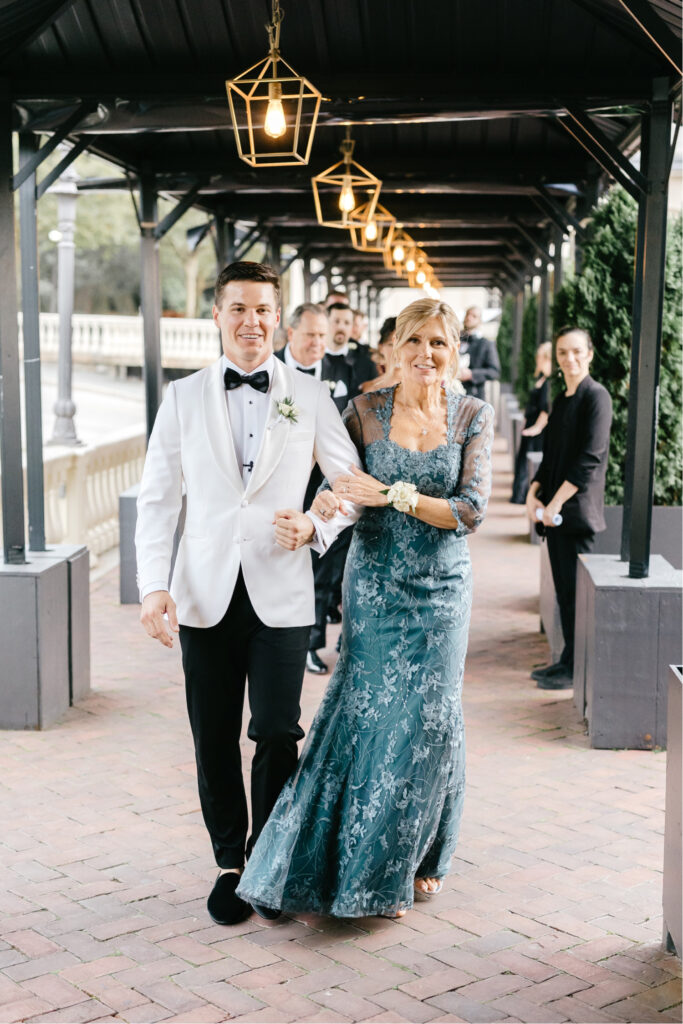 groom walking down the aisle at his Philadelphia Water Works wedding ceremony