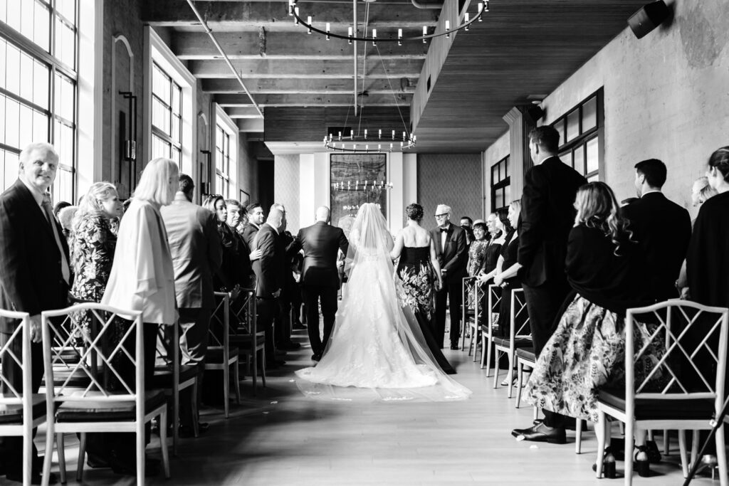 bride walking down the aisle at The Switch House in Philadelphia by Emily Wren Photography