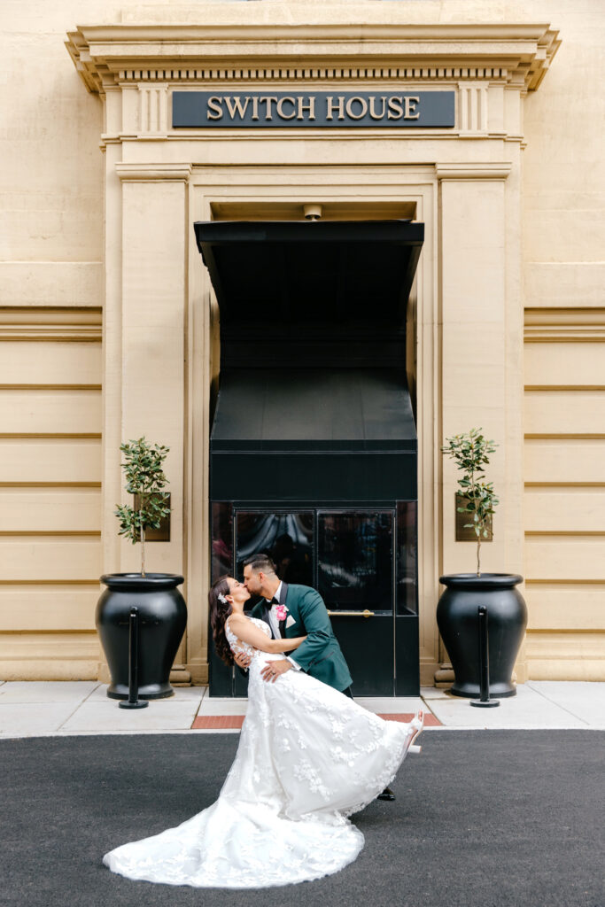 bride & groom kissing outside of Cescaphe's new venue the Switch House by Philadelphia wedding photographer Emily Wren Photography