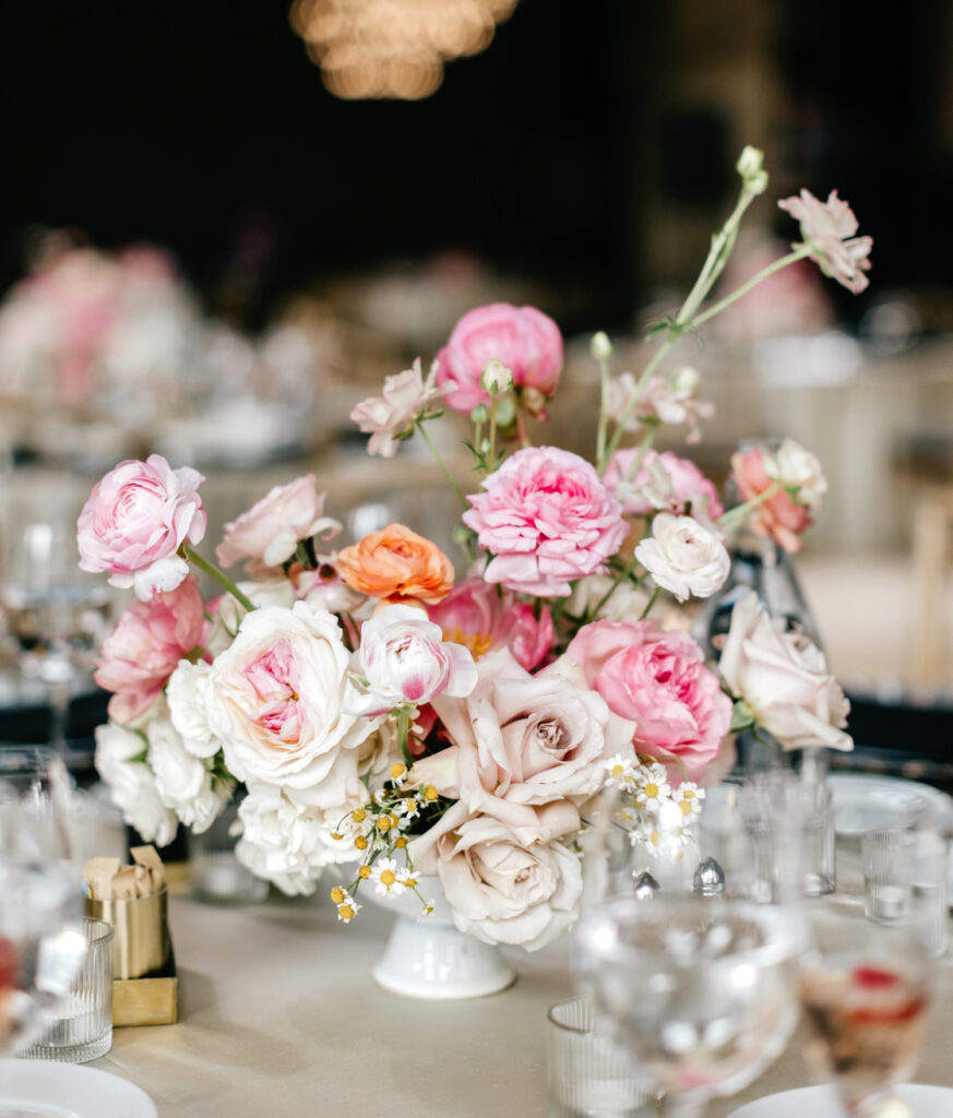 pink, coral & white floral table centerpiece for spring wedding