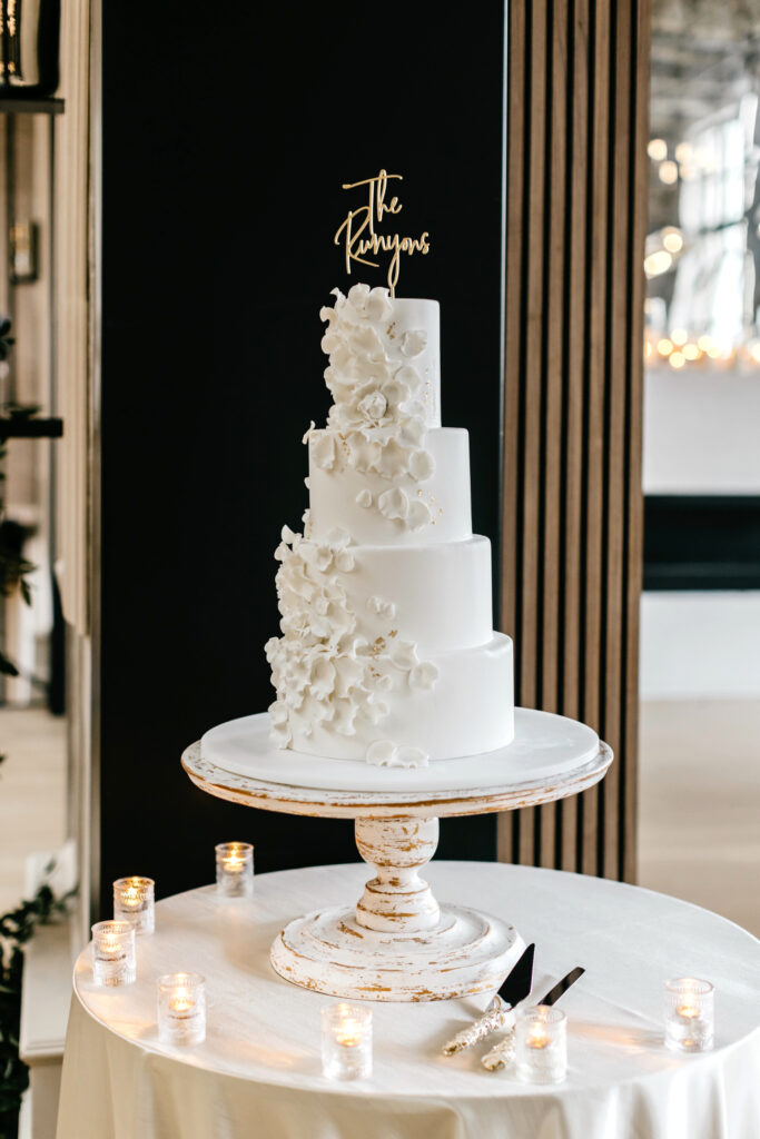 4 tier wedding cake with white floral decal