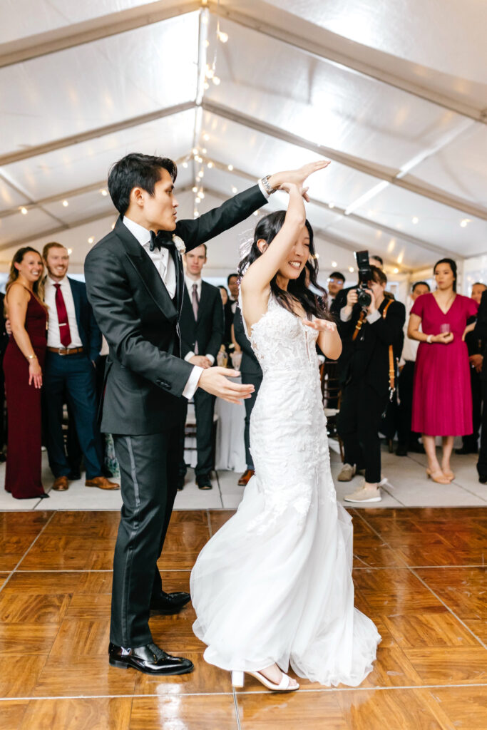 bride & grooms first dance under clear tent by Emily Wren Photography