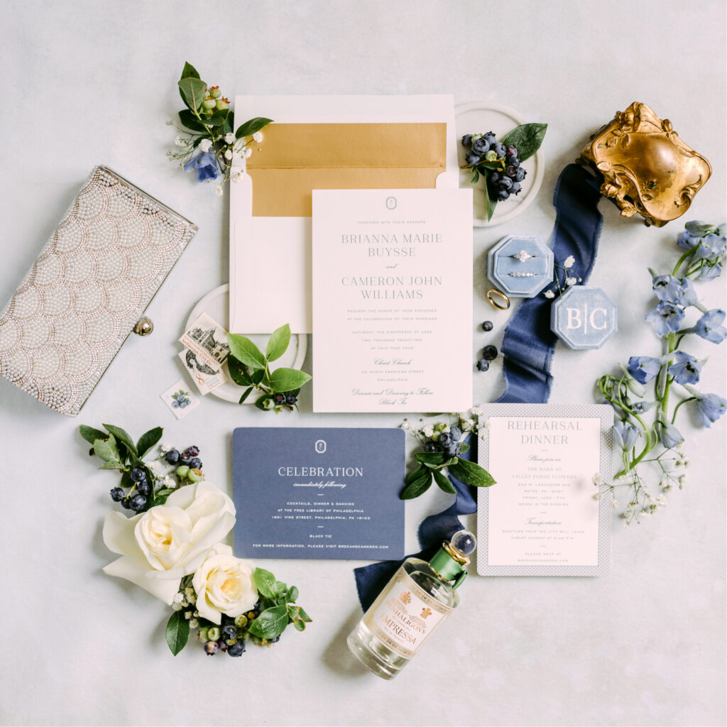 blue white and gold invitation details by Emily Wren Photography