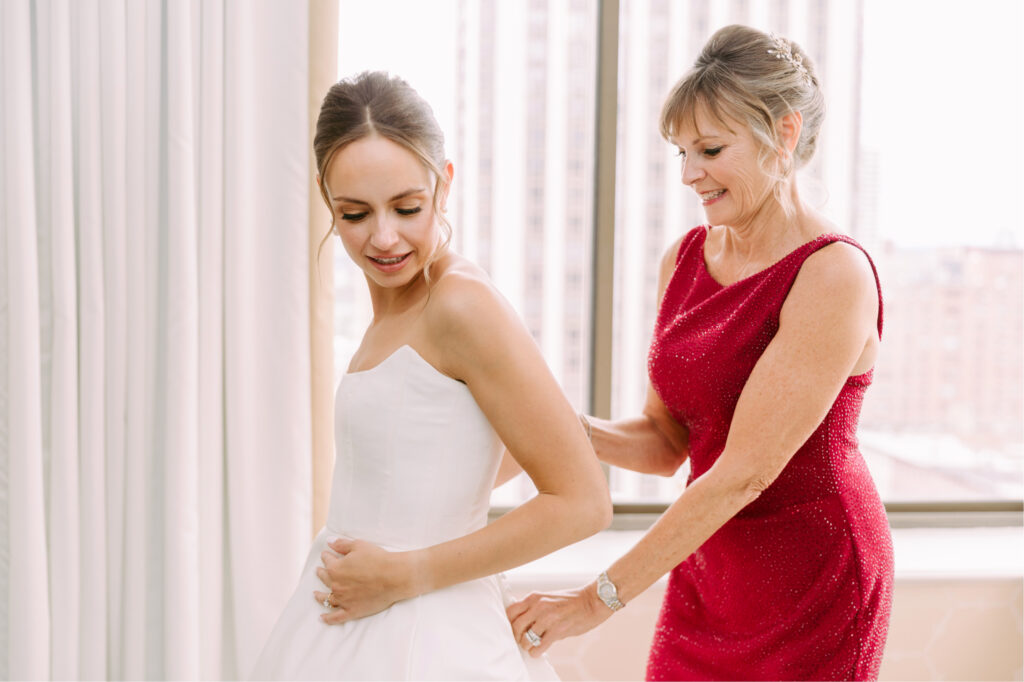 bride getting ready with her mother for her Philadelphia summer wedding day