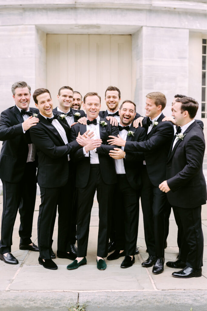 groom with groomsmen at Merchants Exchange in Old City Philadelphia by Emily Wren Photography