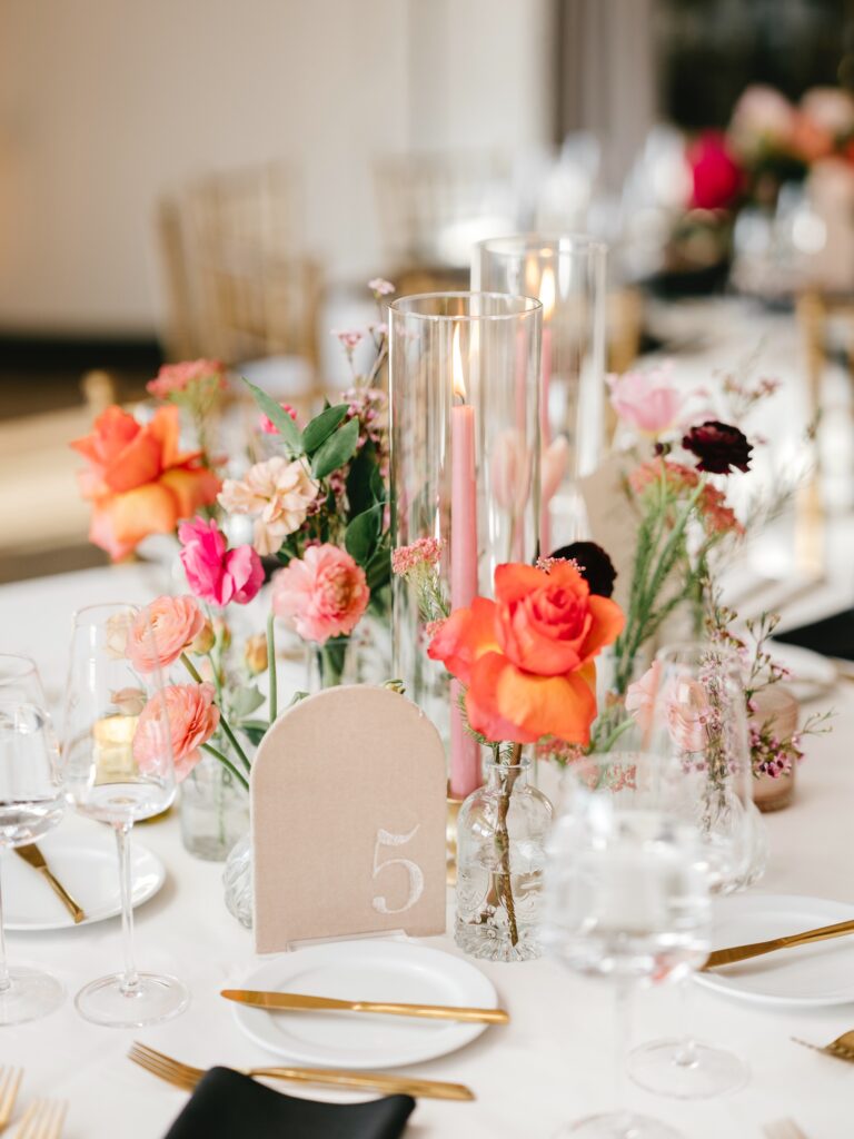 pink, fuchsia & orange table decor for spring wedding reception